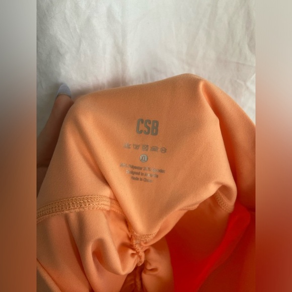 CSB crop shop boutique SERENITY SCRUNCH SHORTS 4" | light orange Size XL - Picture 9 of 9
